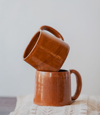 Glazed handmade ceramic mug in earthy tones
