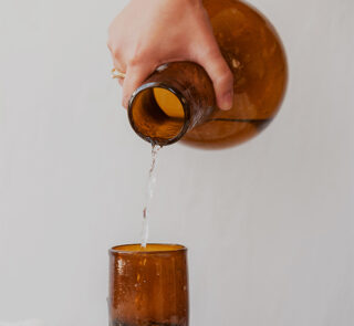 Hand blown glass ware hospitality Rooted in the heritage of traditional Middle Eastern glassmaking.