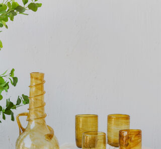Hand blown glass ware hospitality Rooted in the heritage of traditional Middle Eastern glassmaking.