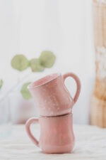 Glazed handmade ceramic mug in earthy tones