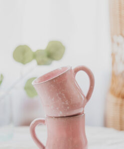Glazed handmade ceramic mug in earthy tones
