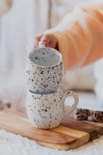 Glazed handmade ceramic mug in earthy tones
