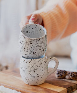 Glazed handmade ceramic mug in earthy tones