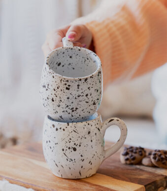 Glazed handmade ceramic mug in earthy tones