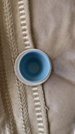 Aeris stoneware Cup Made for slow, easy moments A handcrafted stoneware cup and saucer in soft sky and sand tones, with delicate caramel speckles and a perfectly fitted base.