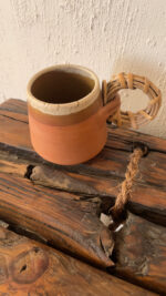 Bara Stoneware Mug Nothing extra. Just how it’s meant to feel A natural clay stoneware mug with a warm amber touch and a handcrafted bamboo handle, designed to feel raw, honest, and close to nature.