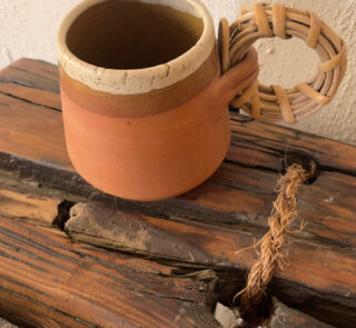 Bara Stoneware Mug Nothing extra. Just how it’s meant to feel A natural clay stoneware mug with a warm amber touch and a handcrafted bamboo handle, designed to feel raw, honest, and close to nature.