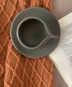 Cuba Stoneware Mug Feels like a place, not just a cup A matte olive stoneware cup and saucer set with a raw textured finish and a flat handle, inspired by the bold Cuban spirit in every sip.