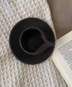 Kuro Kuro Stoneware Mug Quiet, but impossible to ignore A matte black stoneware cup and saucer made for slow, grounded coffee moments that don’t need explanation.