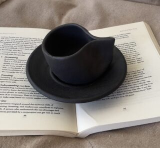Kuro Kuro Stoneware Mug Quiet, but impossible to ignore A matte black stoneware cup and saucer made for slow, grounded coffee moments that don’t need explanation.