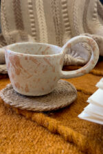 Raku Stoneware Mug Not loud. Just impossible to forget A simple-looking stoneware mug that reveals a quietly different presence.