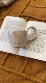 Raku Stoneware Mug Not loud. Just impossible to forget A simple-looking stoneware mug that reveals a quietly different presence.