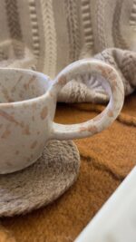 Raku Stoneware Mug Not loud. Just impossible to forget A simple-looking stoneware mug that reveals a quietly different presence.