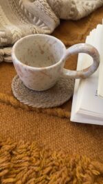 Raku Stoneware Mug Not loud. Just impossible to forget A simple-looking stoneware mug that reveals a quietly different presence.