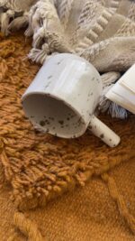Sylva Stoneware Mug Familiar nature… seen in a deeper shade A creamy beige stoneware mug with soft olive speckles, inspired by traditional coffee rituals and quiet everyday moments.
