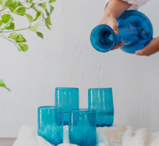 Hand blown glass ware hospitality Rooted in the heritage of traditional Middle Eastern glassmaking.