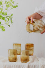 Hand blown glass ware hospitality Rooted in the heritage of traditional Middle Eastern glassmaking.