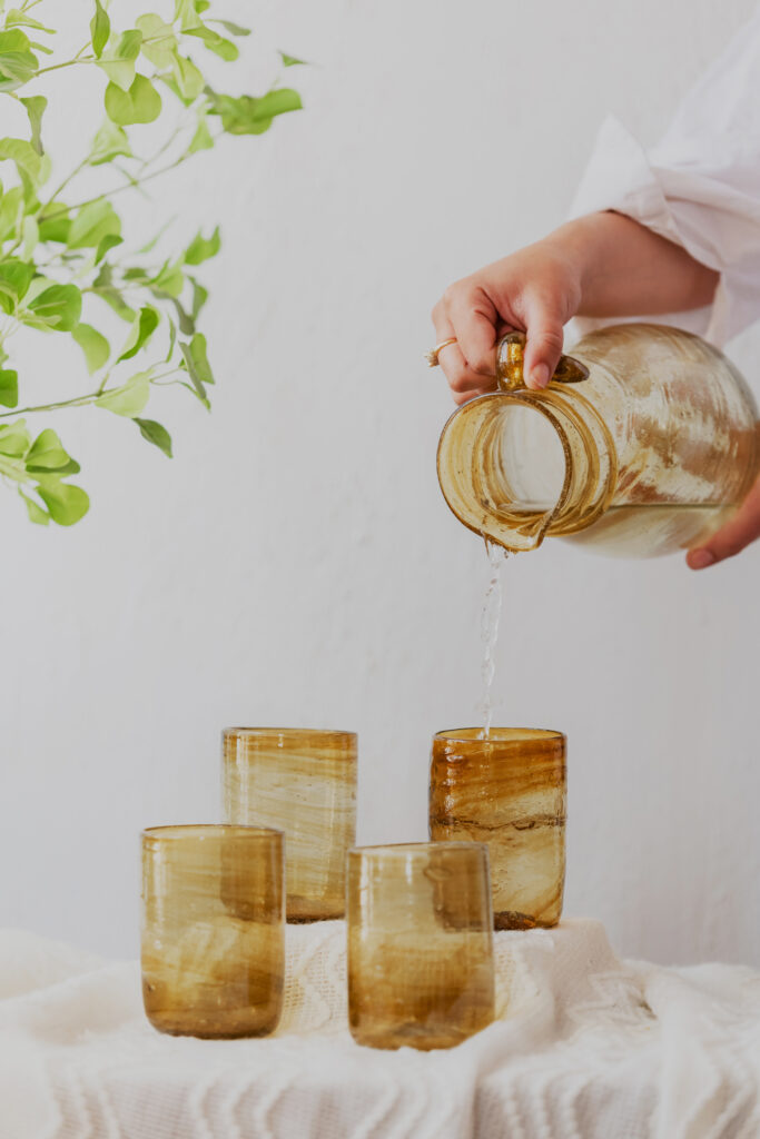Hand blown glass ware hospitality Rooted in the heritage of traditional Middle Eastern glassmaking.