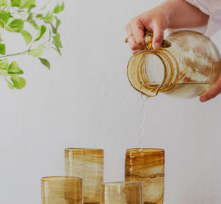 Hand blown glass ware hospitality Rooted in the heritage of traditional Middle Eastern glassmaking.