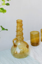 Hand blown glass ware hospitality Rooted in the heritage of traditional Middle Eastern glassmaking.