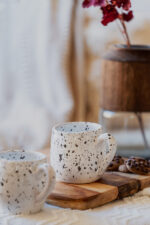 Glazed handmade ceramic mug in earthy tones