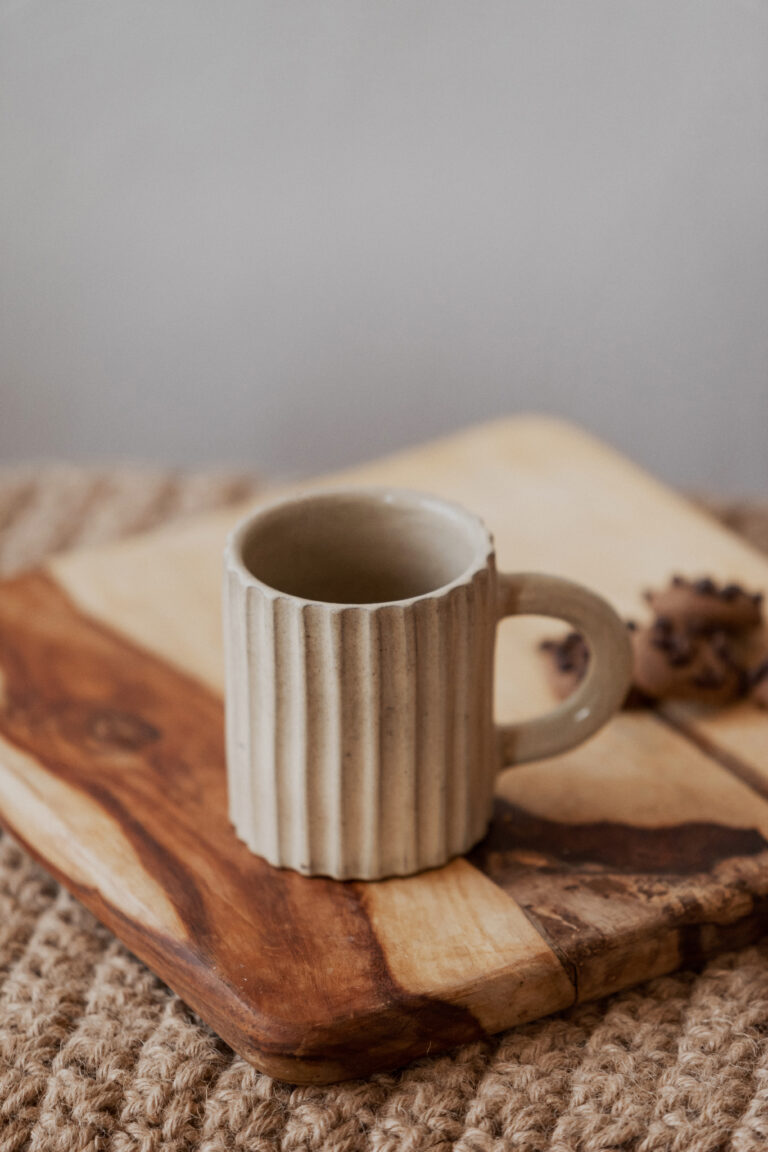 Glazed handmade ceramic mug in earthy tones