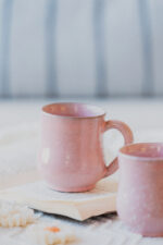 Glazed handmade ceramic mug in earthy tones
