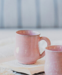 Glazed handmade ceramic mug in earthy tones