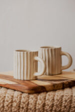 Glazed handmade ceramic mug in earthy tones