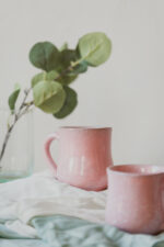 Glazed handmade ceramic mug in earthy tones