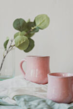 Glazed handmade ceramic mug in earthy tones