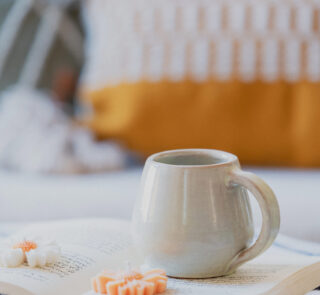 Glazed handmade ceramic mug in earthy tones