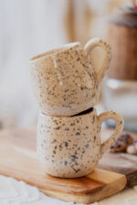 Glazed handmade ceramic mug in earthy tones