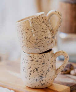 Glazed handmade ceramic mug in earthy tones