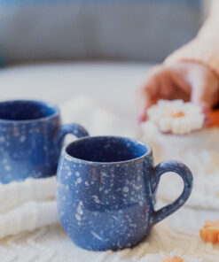 Glazed handmade ceramic mug in earthy tones