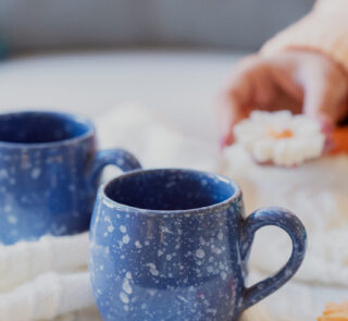 Glazed handmade ceramic mug in earthy tones