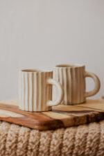 Glazed handmade ceramic mug in earthy tones