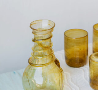 Hand blown glass ware hospitality Rooted in the heritage of traditional Middle Eastern glassmaking.