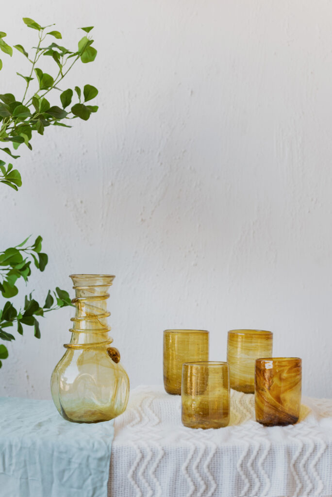 Hand blown glass ware hospitality Rooted in the heritage of traditional Middle Eastern glassmaking.