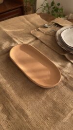Sora Gathering Platter Handcrafted from premium natural stoneware, this medium Wabi-Sabi platter features a smooth earth-toned finish and organic edges—perfectly sized for serving appetizers, side dishes, or styling your space.