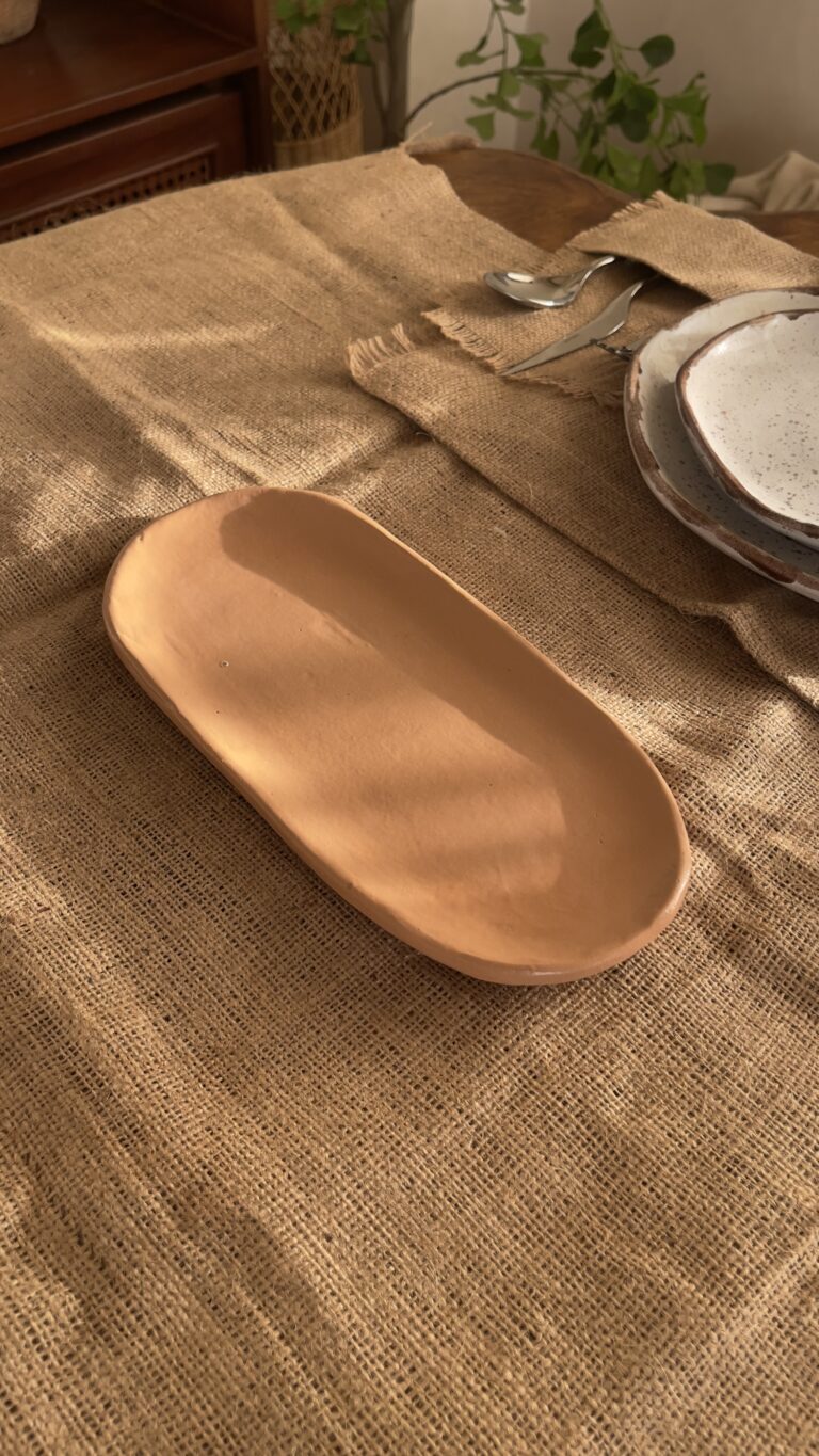 Sora Gathering Platter Handcrafted from premium natural stoneware, this medium Wabi-Sabi platter features a smooth earth-toned finish and organic edges—perfectly sized for serving appetizers, side dishes, or styling your space.