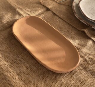 Sora Gathering Platter Handcrafted from premium natural stoneware, this medium Wabi-Sabi platter features a smooth earth-toned finish and organic edges—perfectly sized for serving appetizers, side dishes, or styling your space.