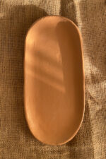 Sora Gathering Platter Handcrafted from premium natural stoneware, this medium Wabi-Sabi platter features a smooth earth-toned finish and organic edges—perfectly sized for serving appetizers, side dishes, or styling your space.