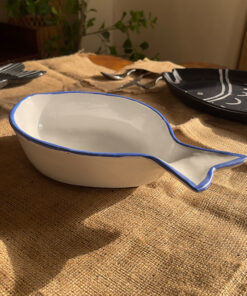 Caspian Fish Bowl Enjoy your seafood in a refreshing, open-air seaside vibe. Featuring a clean white base and a vibrant blue hand-painted rim, this fish-shaped individual bowl is perfect for your personal servings of seafood soup or pasta.